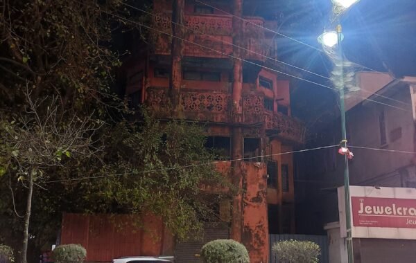 Rajpur Road Dehradun street commercial buildings historic colonial