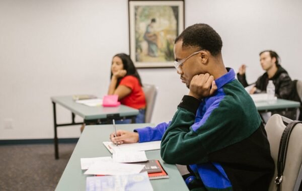 Students checking UK Board Result 2026 on laptop